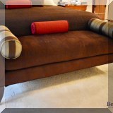 F40. Upholstered ultra suede bench. 22&rdquo;h x 65&rdquo;w x 23&rdquo;d 